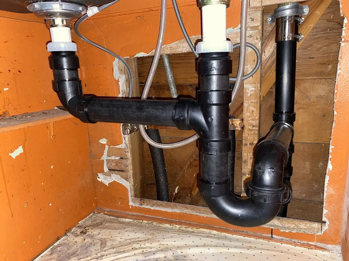 Professional Garbage Disposal Repair equipment and tools on the job in Melissa